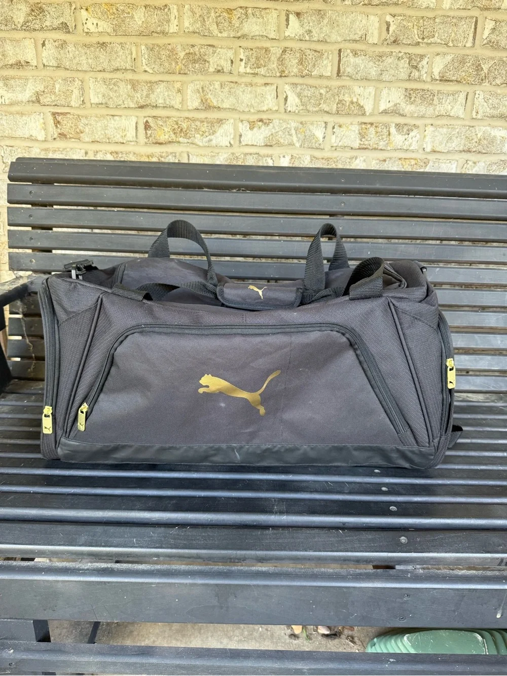 Puma Black Duffel Bag with Gold Logo